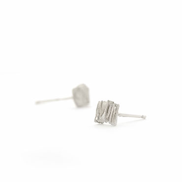 small, rough earrings in silver