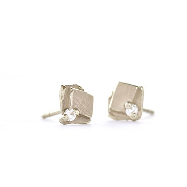 Playful square ear studs with diamond