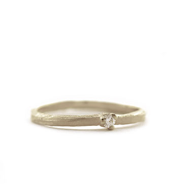 Fine ring with diamond and subtle structure