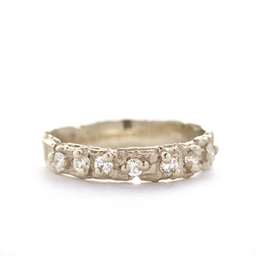 small rough ring with 7 diamonds
