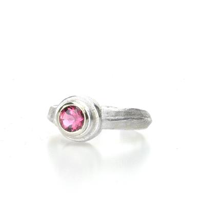 ring with large tourmaline and gold setting