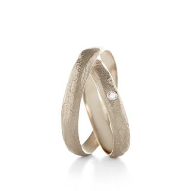 Fine rough-textured wedding rings