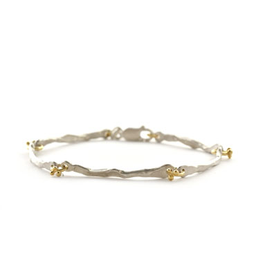 silver bracelet with golden links
