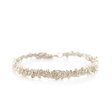 Bloemetjes armband in goud