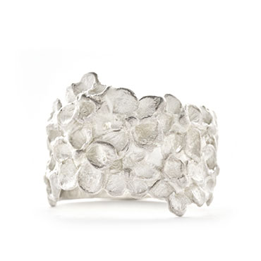 wide floral ring in silver