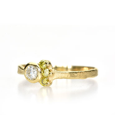 yellow gold ring with colored diamonds