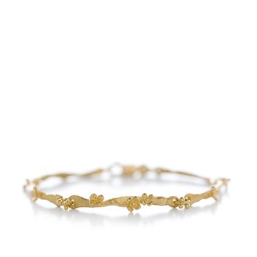 Golden bracelet with floral details - Wim Meeussen Antwerp