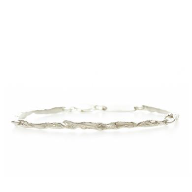 Rough and organic bracelet in silver