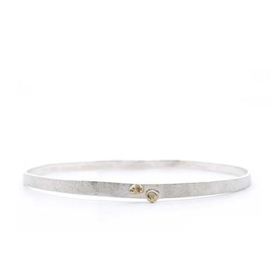 bracelet solide en argent avec un detail en or