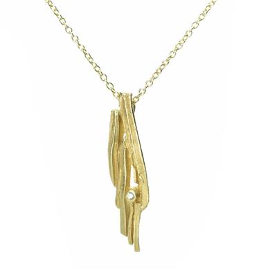 Gold oblong pendant with diamond