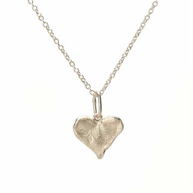 Gold pendant in the shape of a heart