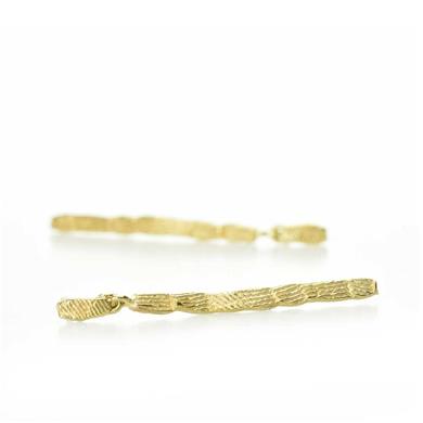 Long ear studs with rough texture