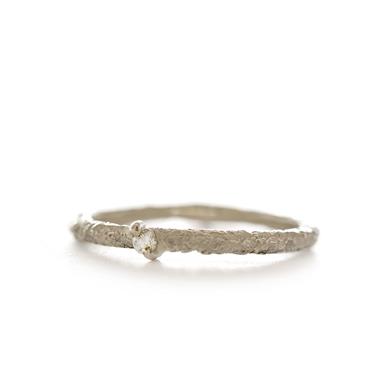 Fine ring with small diamond