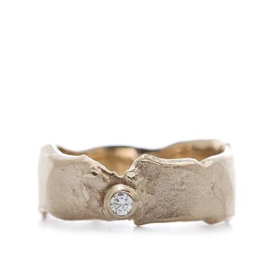 Asymmetrical wide ring with diamond
