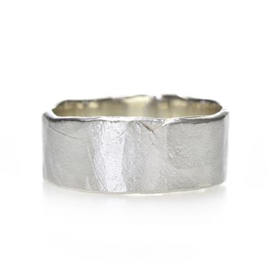 Wide hammered ring in silver