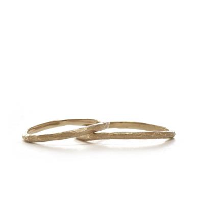 Fine twigs of gold wedding rings