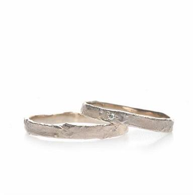 Fine rough wedding rings in white gold