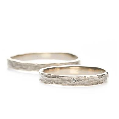 Narrow rough wedding rings in white gold