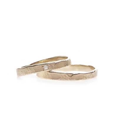 Golden wedding rings with hammered texture