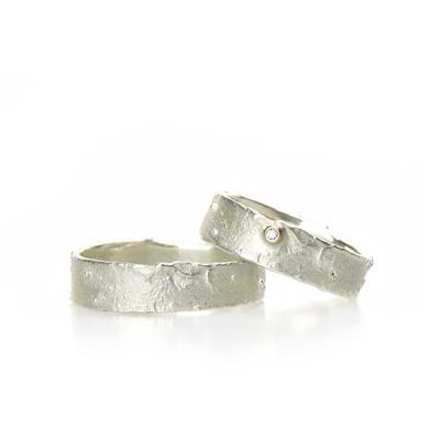 Fine rough wedding rings in silver