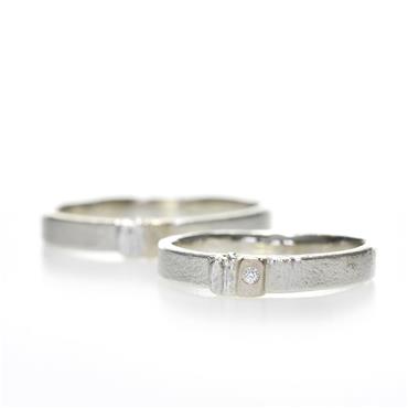 Wedding ring in silver with subtle detail in gold