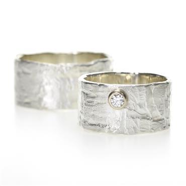 Wide silver wedding bands with structure