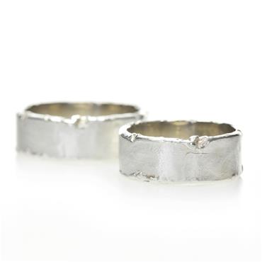 Wedding band in silver with rough edges