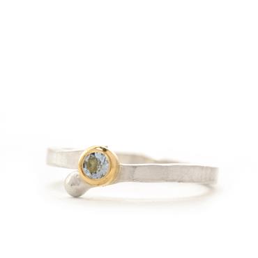 Ring in silver with aquamarine in yellow gold