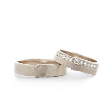 Wedding rings with a row of diamonds