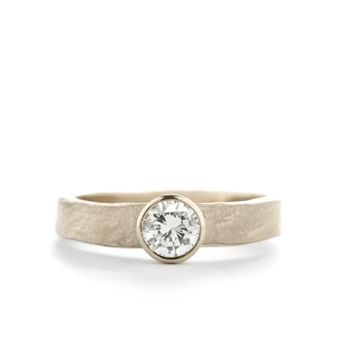 Classic engagement ring with a wide band