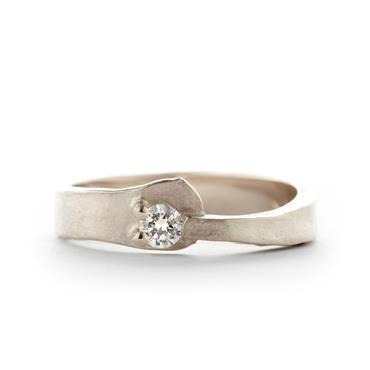 Golden asymmetric engagement ring