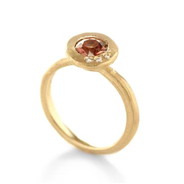 Ring with color stone in wide-open-setting